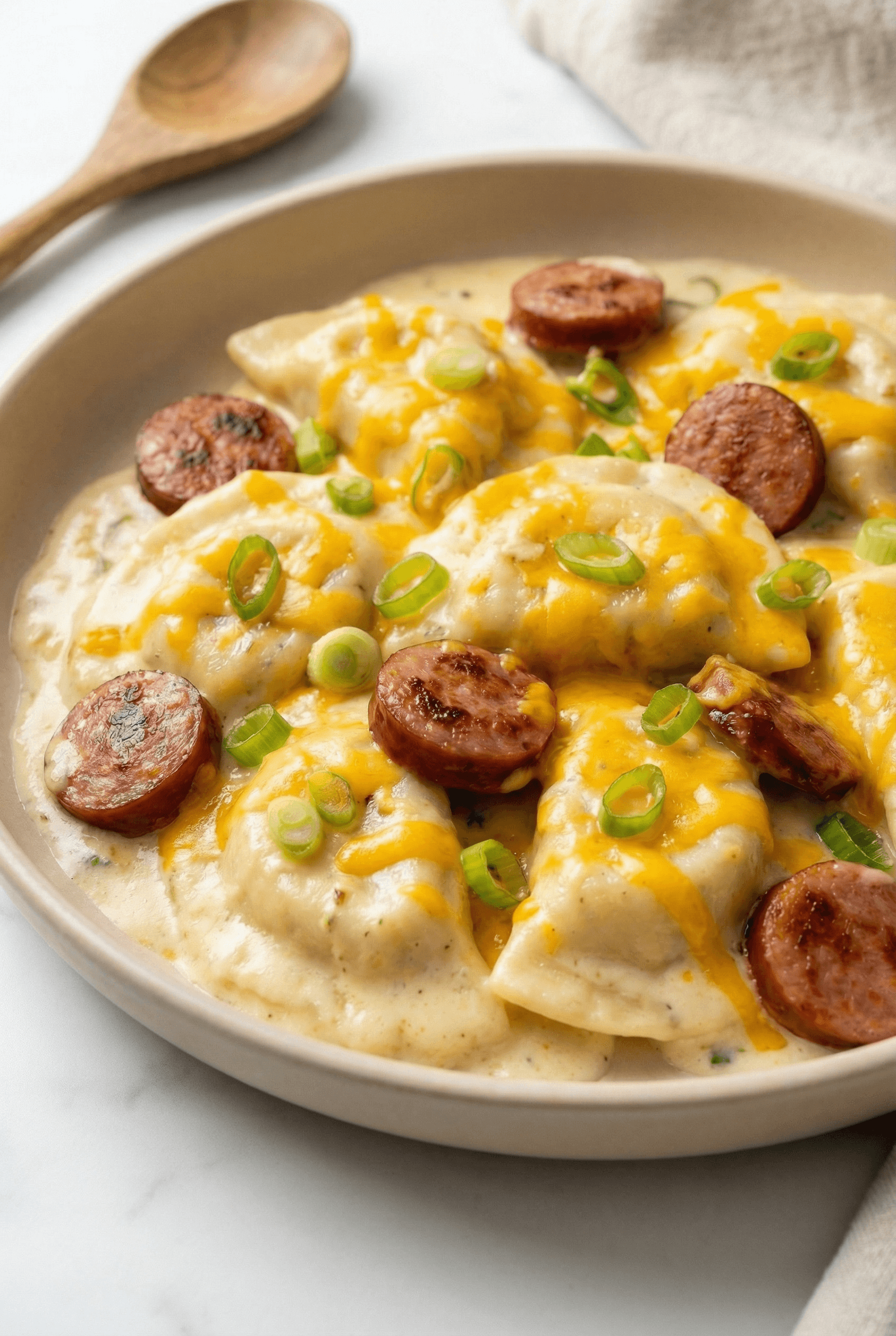 Crockpot Pierogi Casserole with Kielbasa and Creamy Cheddar