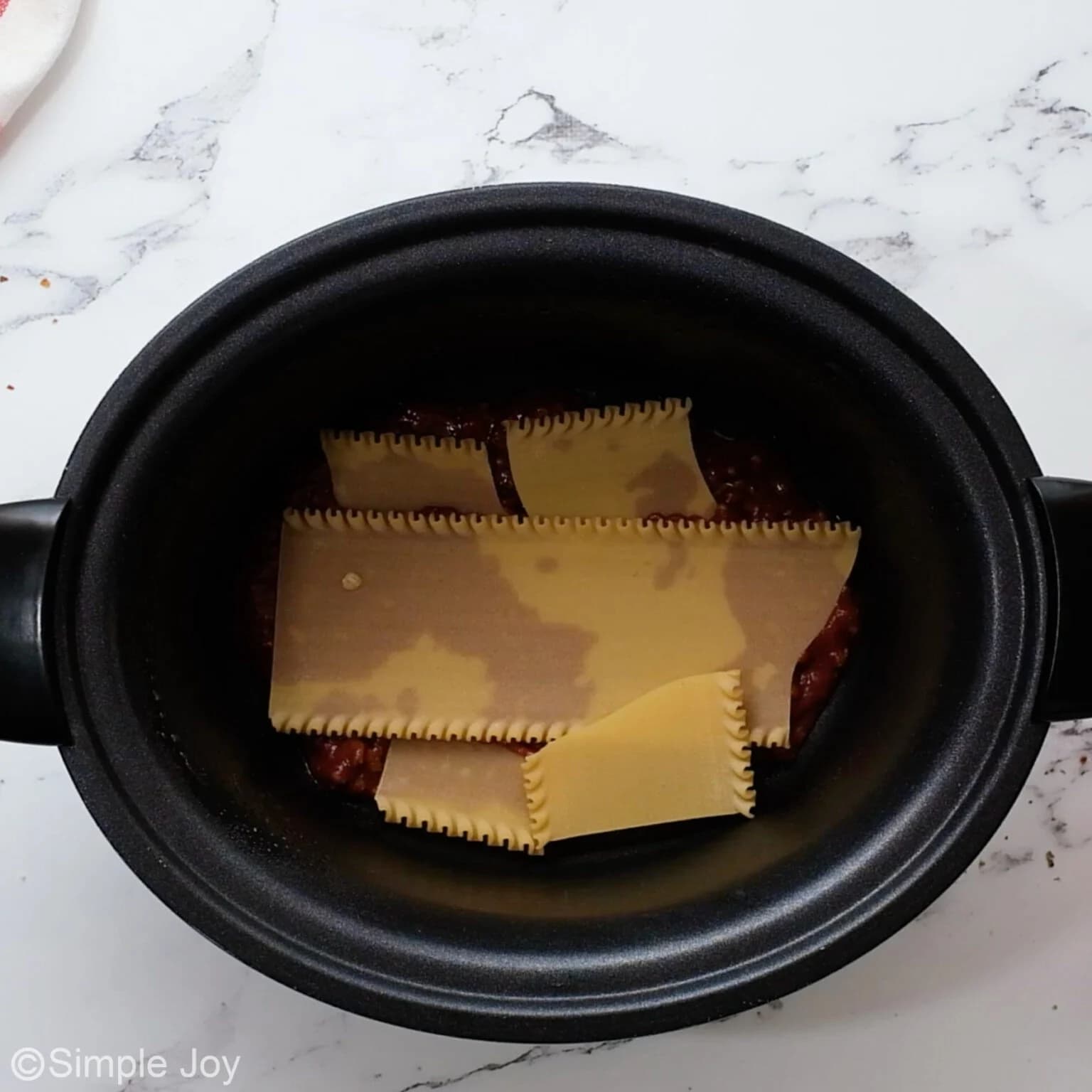 Crockpot Lasagna with Homemade Meat Sauce and Three Cheeses