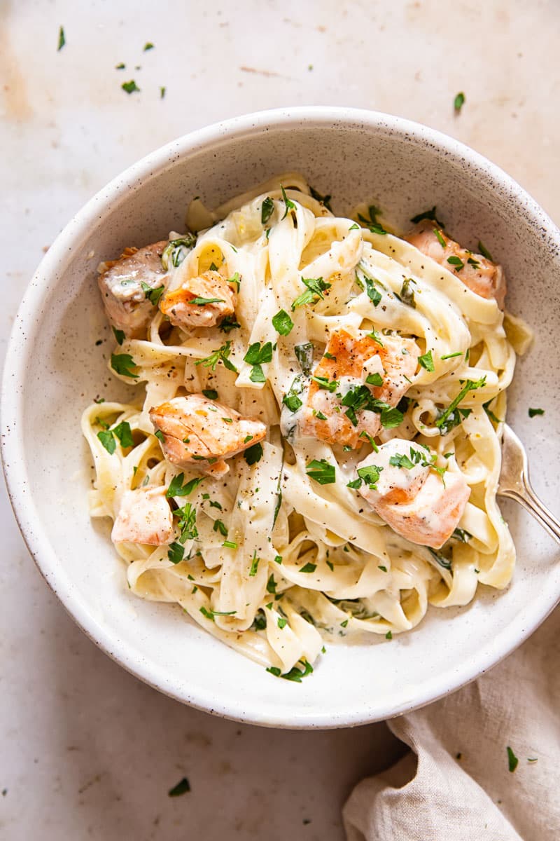 Creamy Salmon Pasta with Mixed Greens and White Wine Cream Sauce