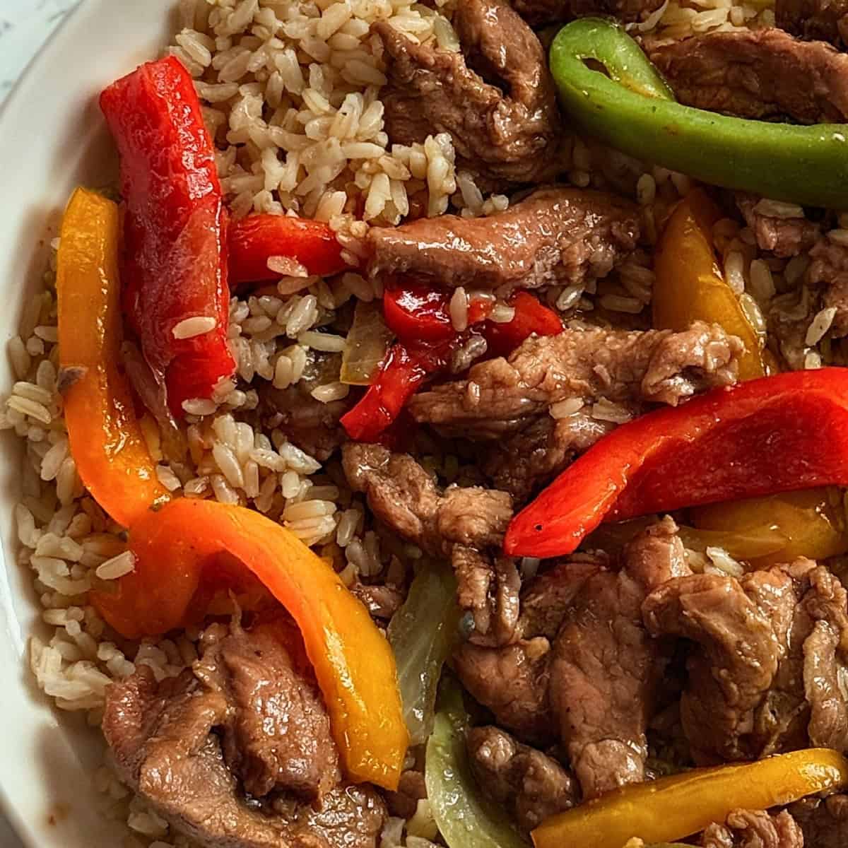 Crockpot Pepper Steak with Tender Sirloin and Savory Pepper Sauce