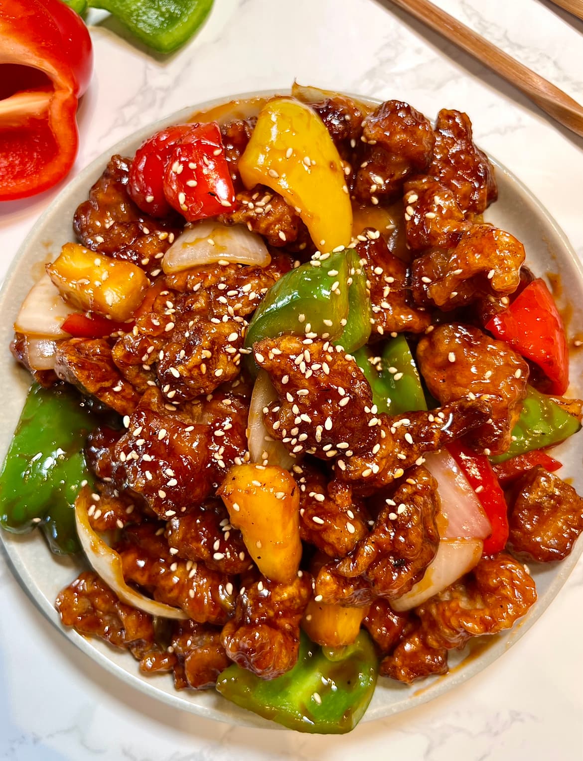 Sweet and Sour Pork with Crispy Batter and Tangy Red Sauce