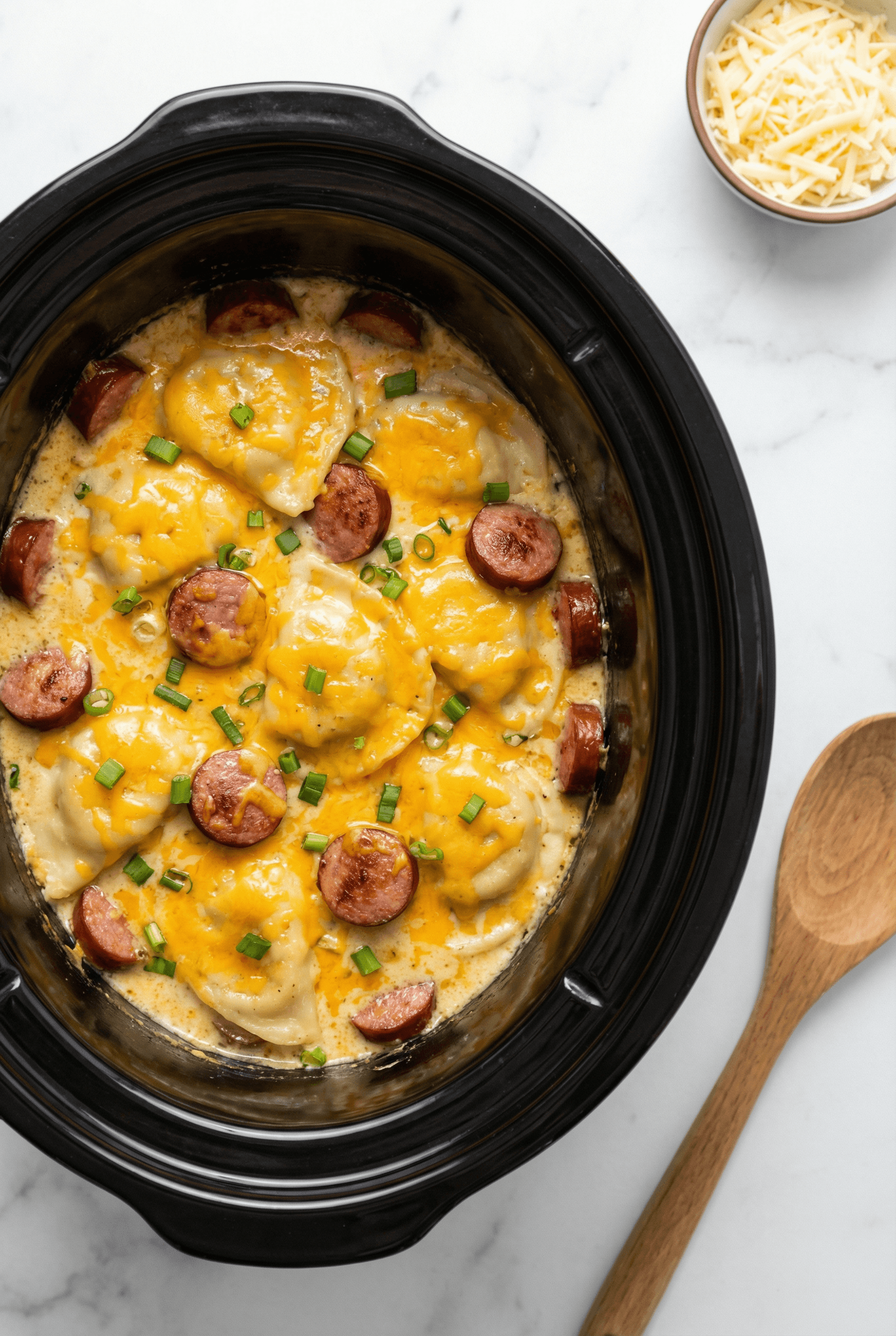 Crockpot Pierogi Casserole with Kielbasa and Creamy Cheddar